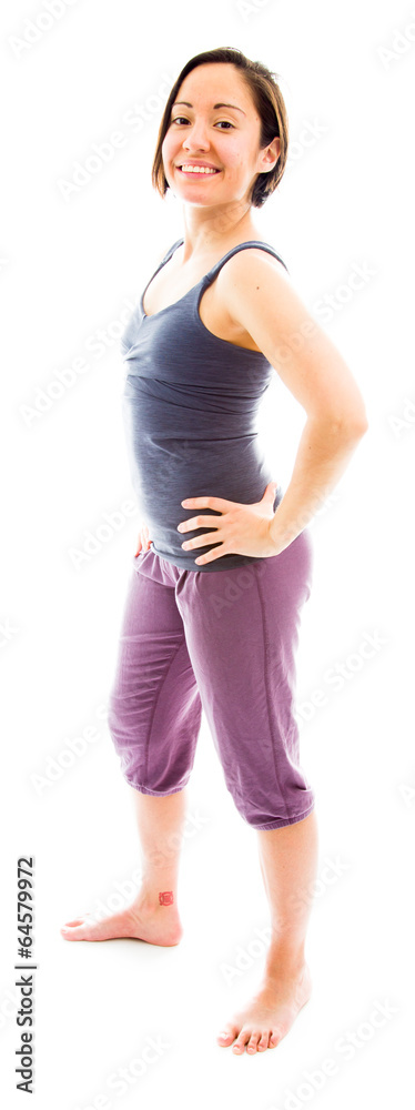 Young woman standing with her arms akimbo Young woman standing with her arms akimbo