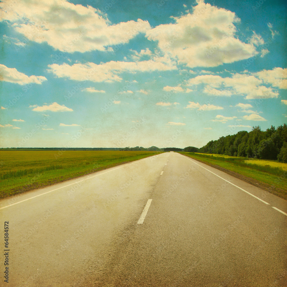 Asphalt road in grunge and retro style.