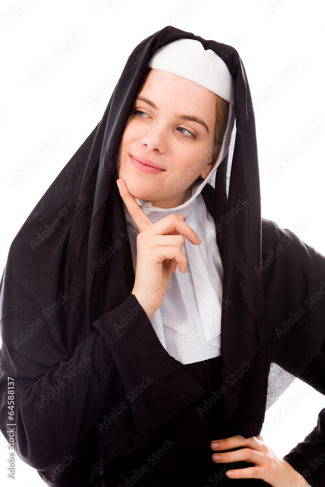Young woman thinking with her finger on chin Young woman thinking with her finger on chin