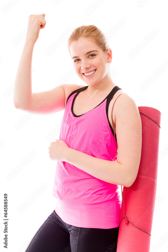 Young woman carrying exercising mat and celebrating success Young woman carrying exercising mat and celebrating success