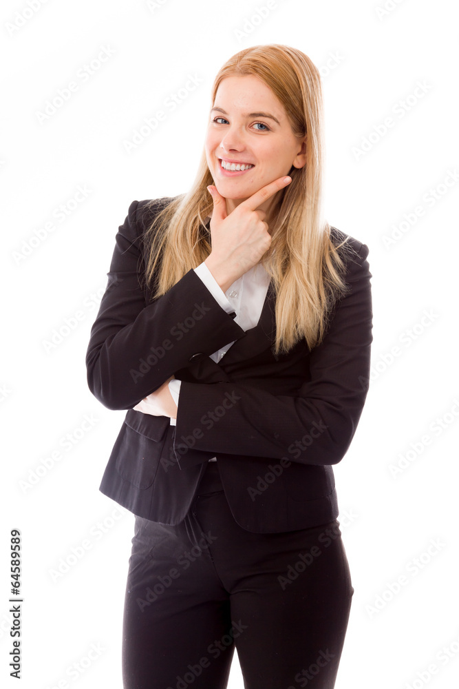 Businesswoman standing with hand on chin