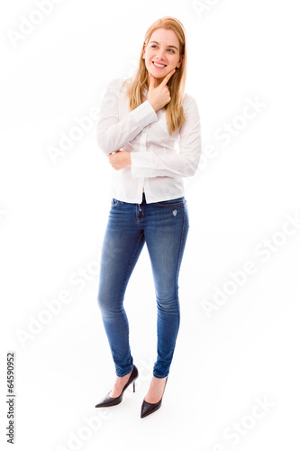 Young woman smiling with her hand on chin