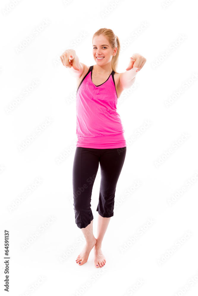 Young woman pointing towards camera with both hands Young woman pointing towards camera with both hands