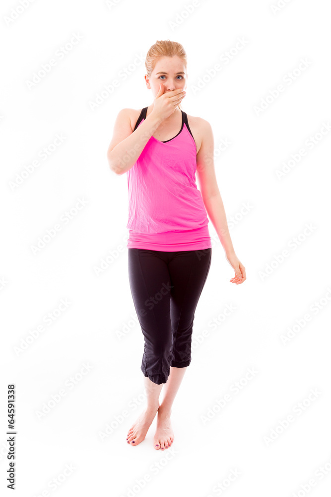 Young woman with hand over mouth Young woman with hand over mouth