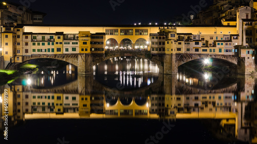Ponte Vecchio bridge by night in Florence (Italy)
