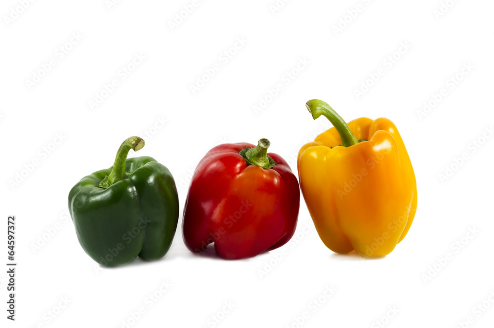 colored peppers over white background colored peppers over white background