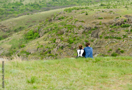 Wallpaper Mural Romantic couple sitting enjoying the outdoors Torontodigital.ca