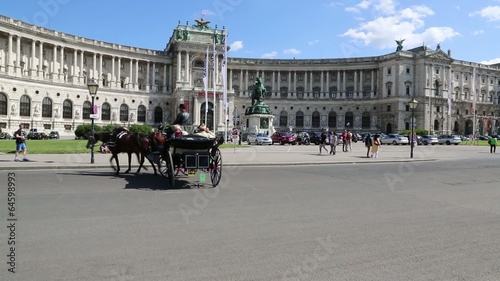 VIENNA, AUSTRIA - CIRCA 2013: The Hofburg palace in Michaelerplatz square circa 2013 in Vienna, Austria. 