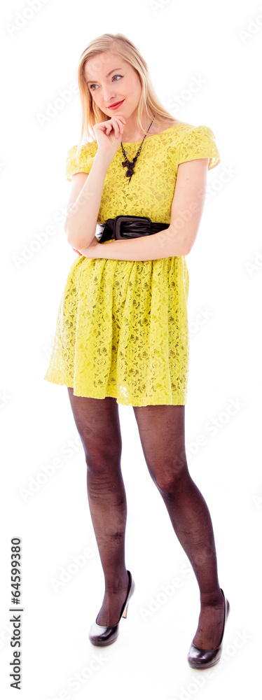 Beautiful young woman standing with her hand on chin Beautiful young woman standing with her hand on chin