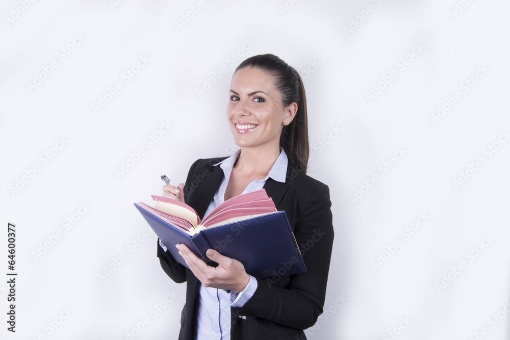 Happy beautiful business woman / student with notebook Happy beautiful business woman / student with notebook