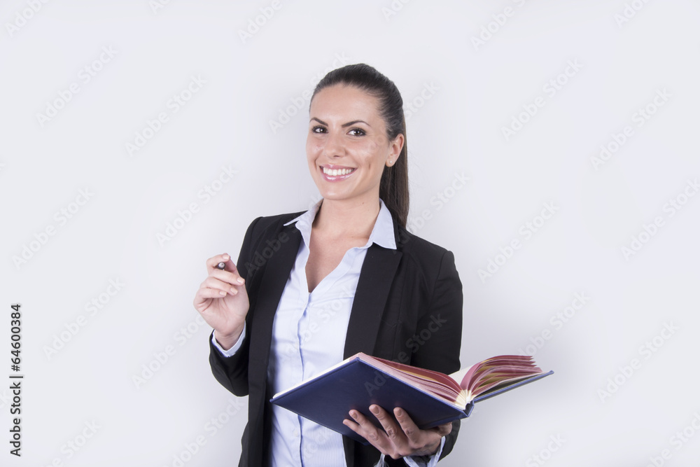 Happy business woman / student with notebook Happy business woman / student with notebook
