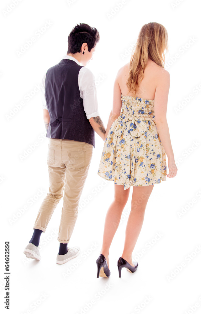 Rear view of a lesbian couple walking together Rear view of a lesbian couple walking together