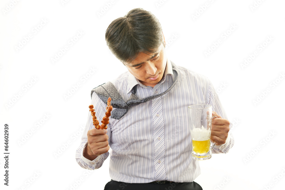 ビールを飲みすぎたサラリーマン