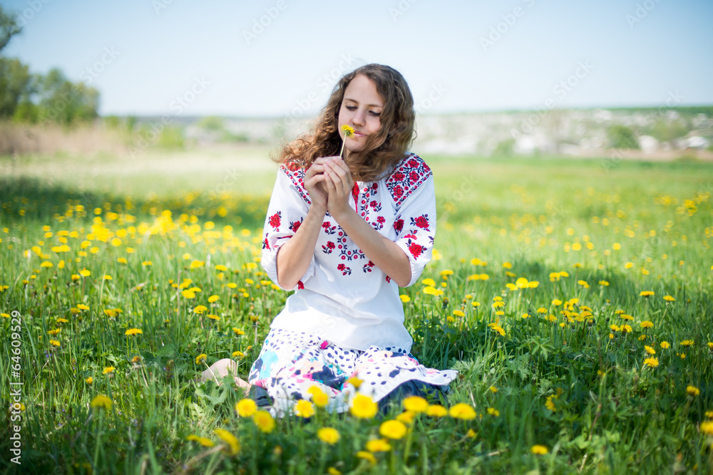 The young Ukrainian girl whit yellow flowers The young Ukrainian girl whit yellow flowers