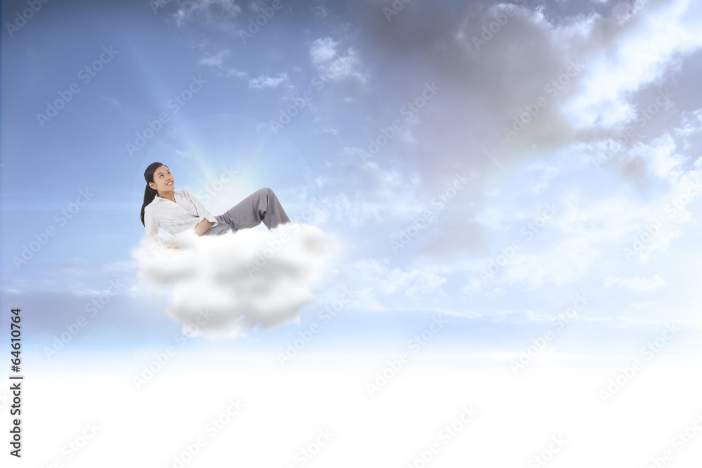 Composite image of relaxed businesswoman lying Composite image of relaxed businesswoman lying