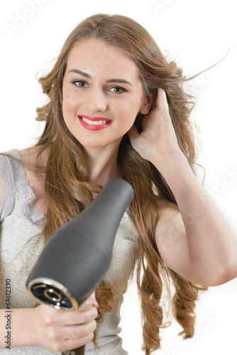 Woman using Hairdryer