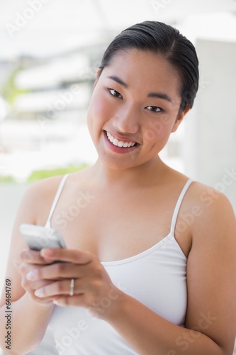 Free Download Asian woman texting on phone - GFXLoad
