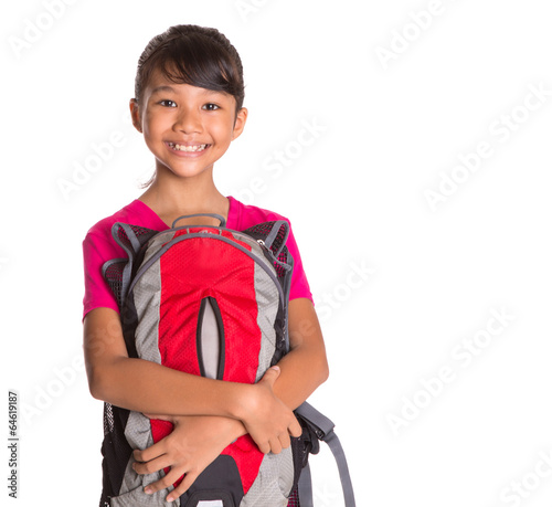 Young Malay Asian girl student with a backpack over white 