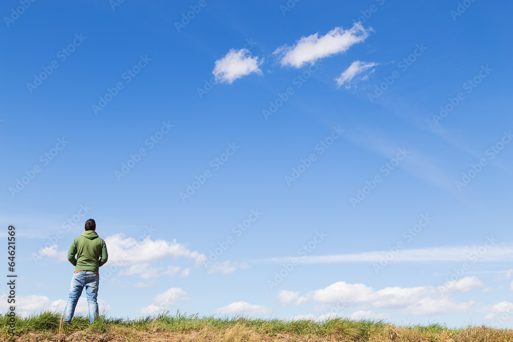 man looking at the horizon