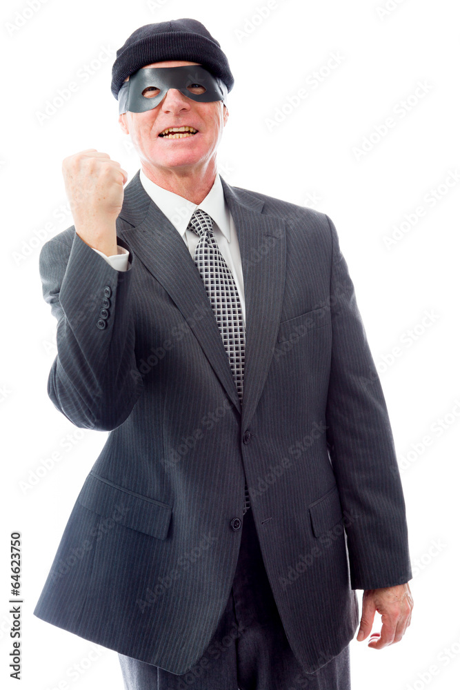 Businessman wearing eye mask and punching the air Businessman wearing eye mask and punching the air