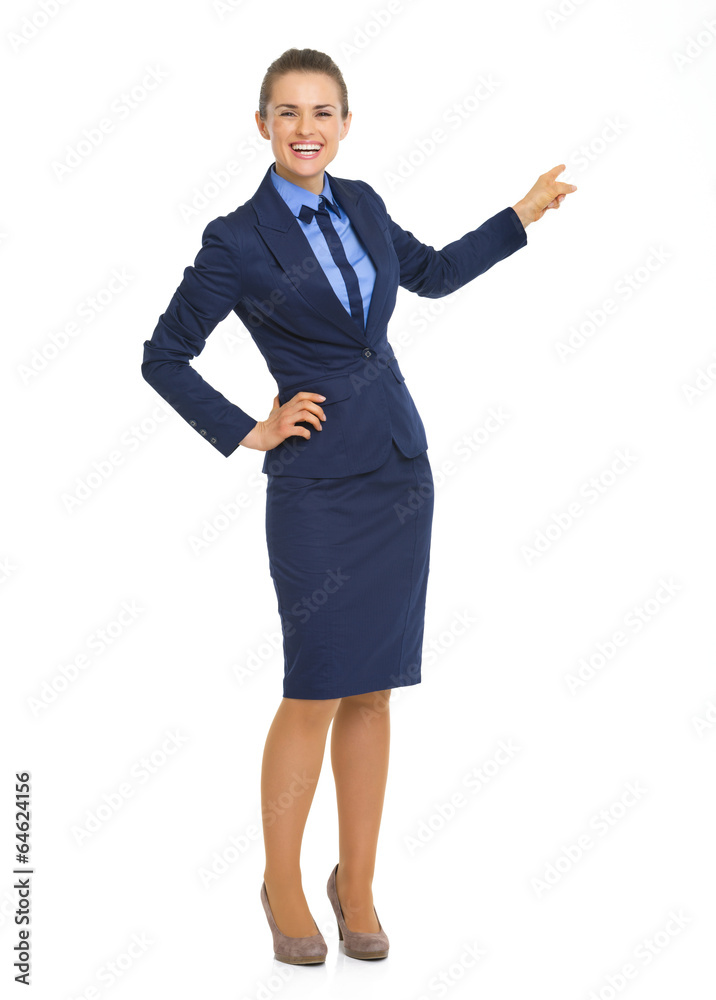 Portrait of business woman pointing behind on copy space Portrait of business woman pointing behind on copy space