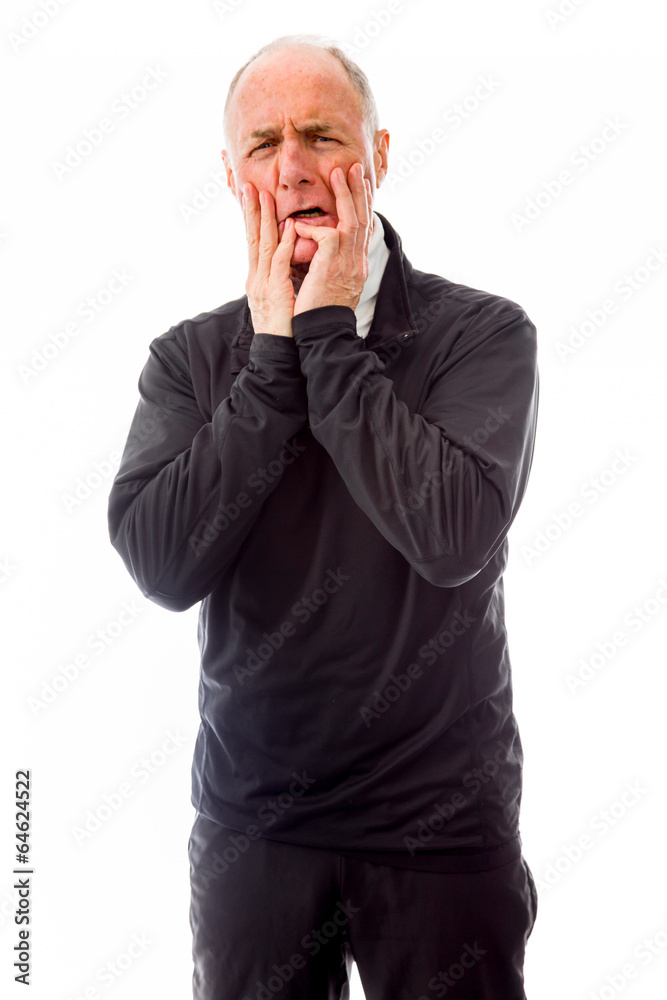 Senior man scared with head in hands Senior man scared with head in hands