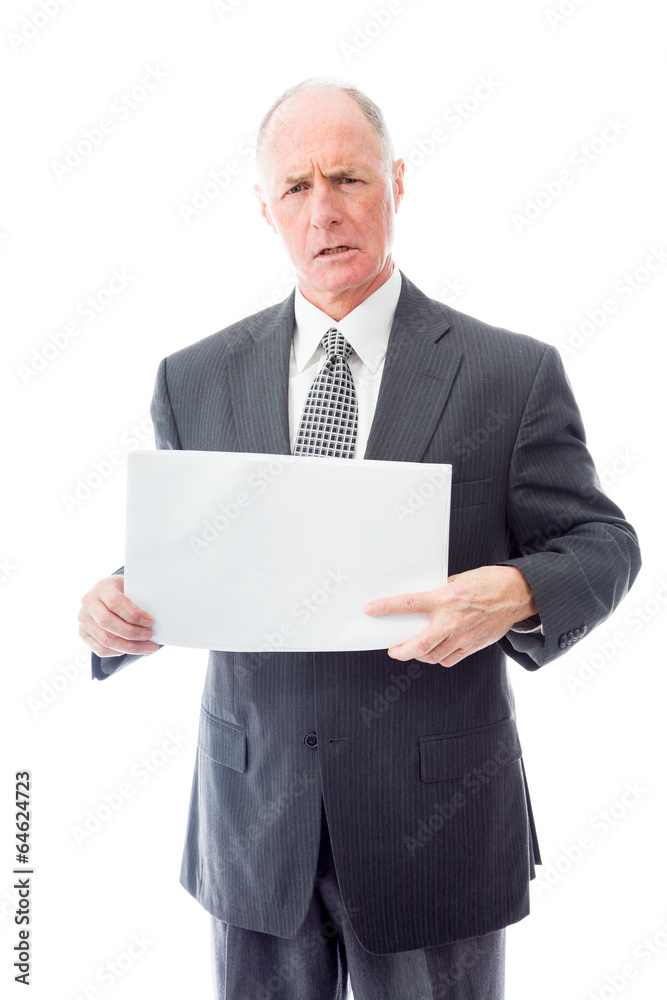 Frustrated businessman holding a blank placard Frustrated businessman holding a blank placard