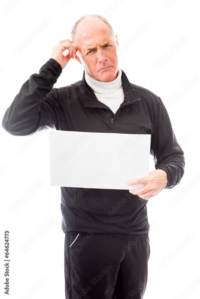 Senior man holding a blank placard and scratching his head Senior man holding a blank placard and scratching his head