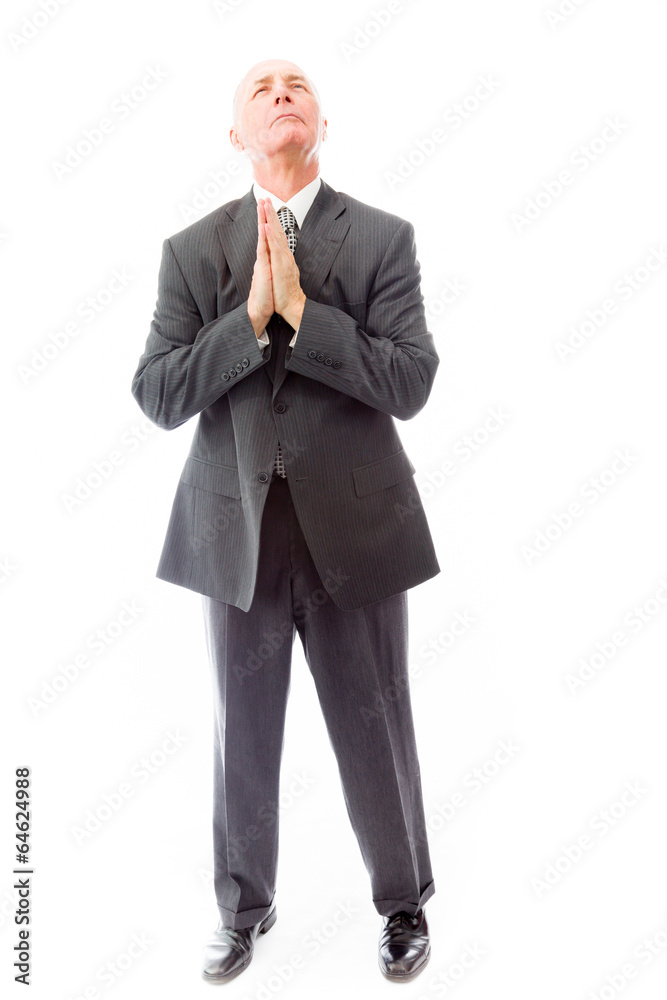 Businessman praying Businessman praying