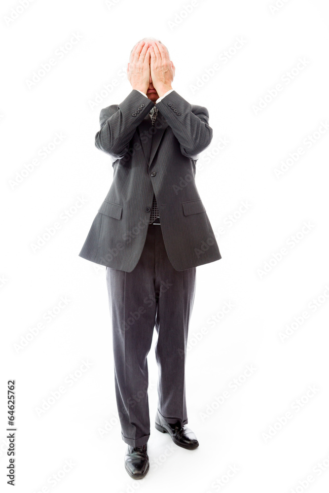Businessman crying in grief Businessman crying in grief