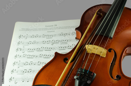 Closeup photo of violin and bow