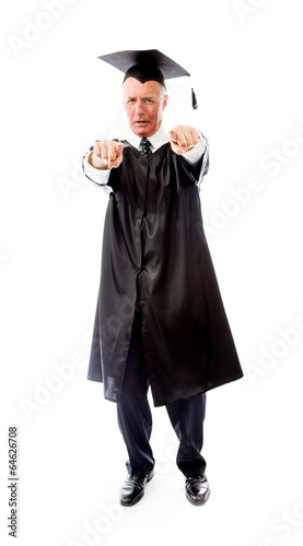 Angry senior male graduate pointing with both hands
