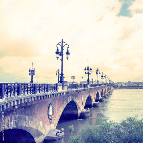 Old stony bridge in Bordeaux #64634737