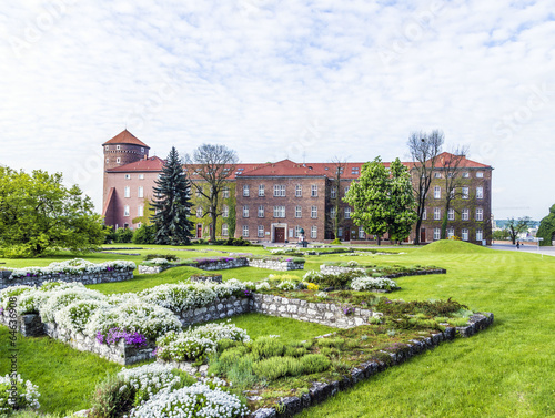 Wawel castle on sunny day with blue sky and white clouds