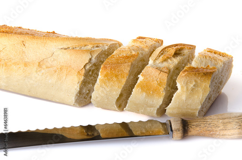 Slices of baguette with a knife