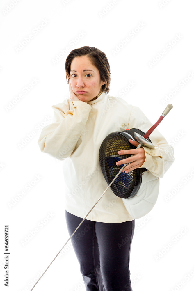 Female fencer looking sad with a holding mask and sword Female fencer looking sad with a holding mask and sword