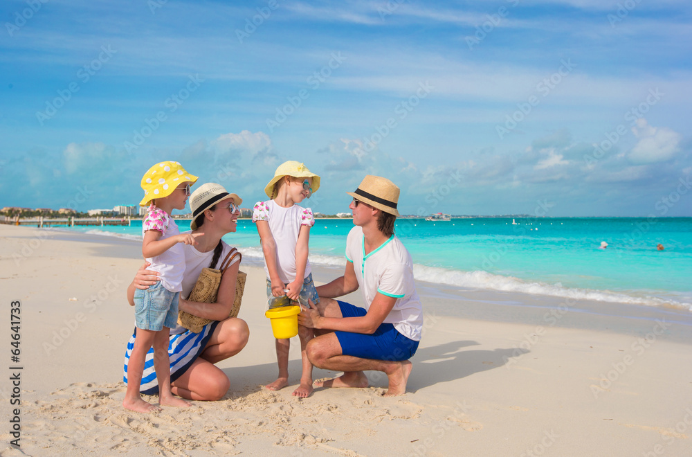 Happy family with two kids on summer vacation Happy family with two kids on summer vacation