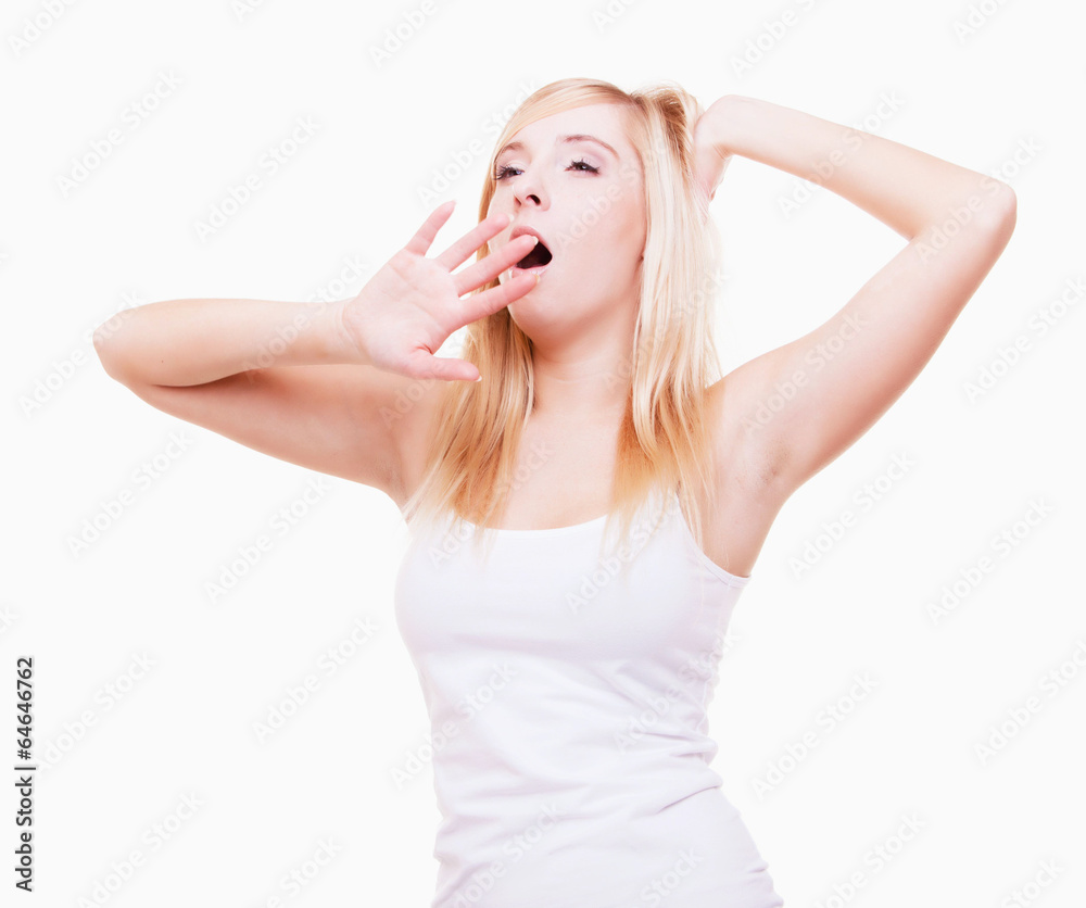 Sleepy tired young woman yawning isolated on white Sleepy tired young woman yawning isolated on white