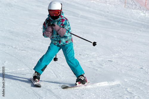 Teenage girl in mountain ski