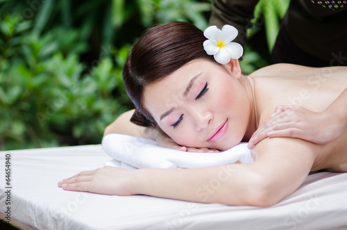 Beautiful Asian woman doing spa massage