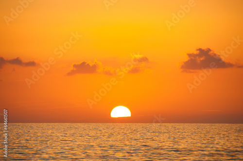 Fabulous sunset on a background of sky and sea.
