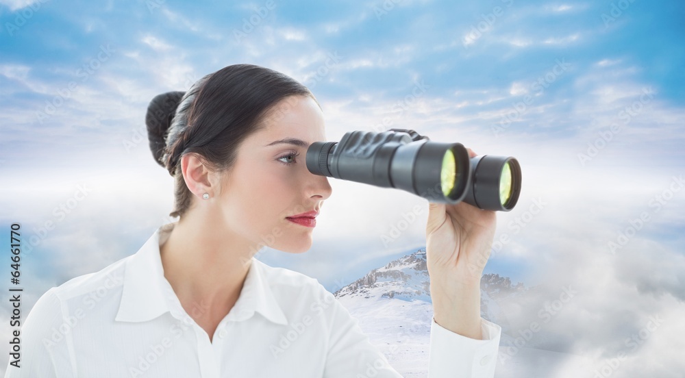 Composite image of business woman looking through binoculars Composite image of business woman looking through binoculars