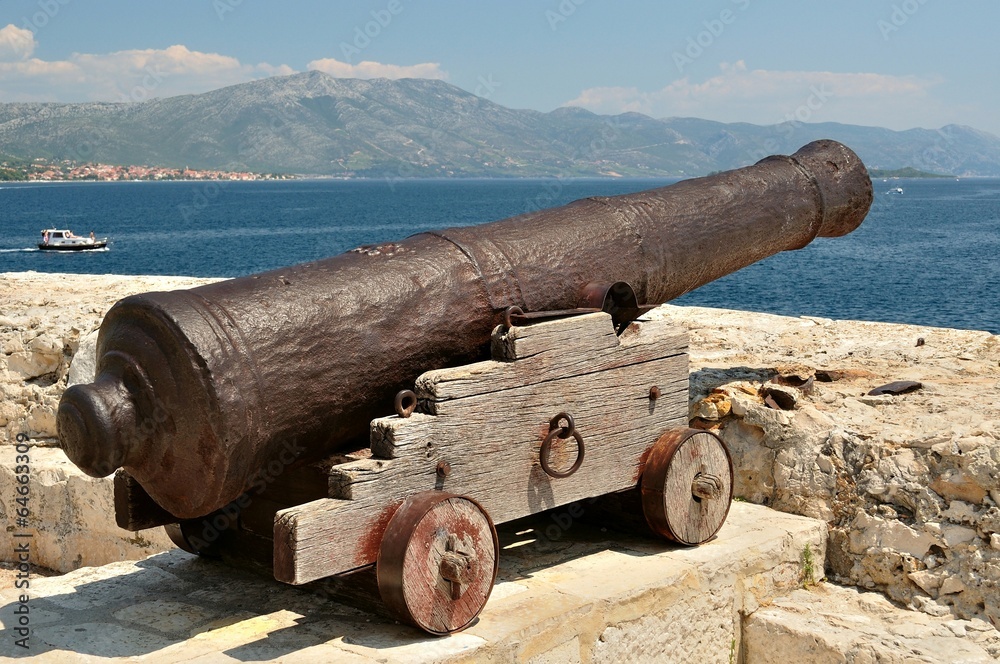 Old cannon at old fortress in medieval town Korcula in Croatia
