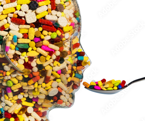 head made of glass with tablets photo