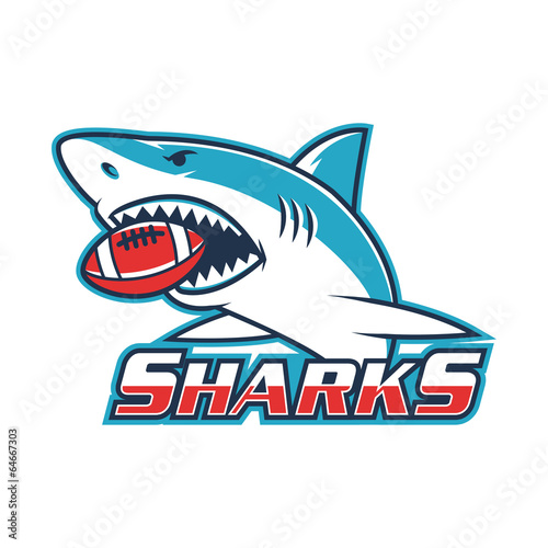 Emblem shark holds ball in his mouth