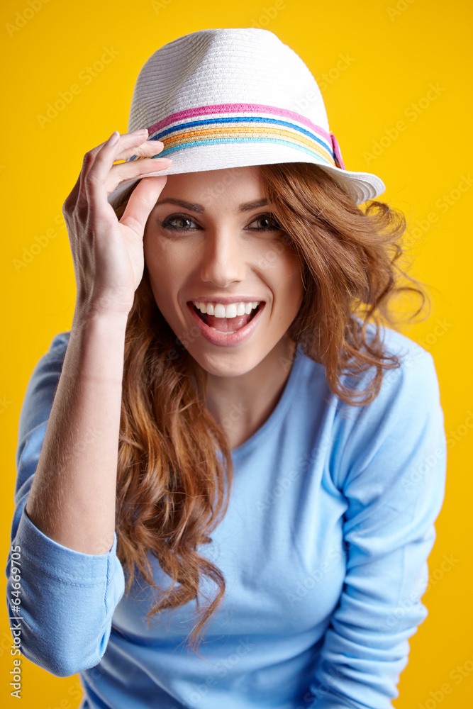 Fototapeta premium Smiling woman in studio portrait