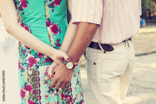 Holding hands couple dating