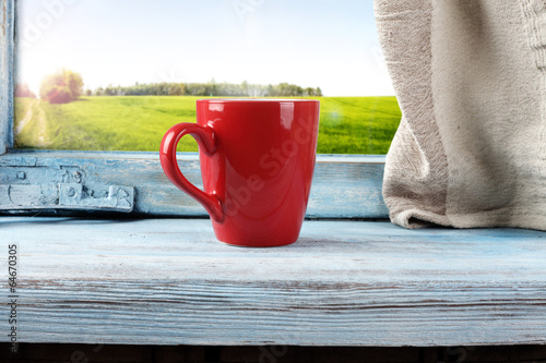 red mug and sill