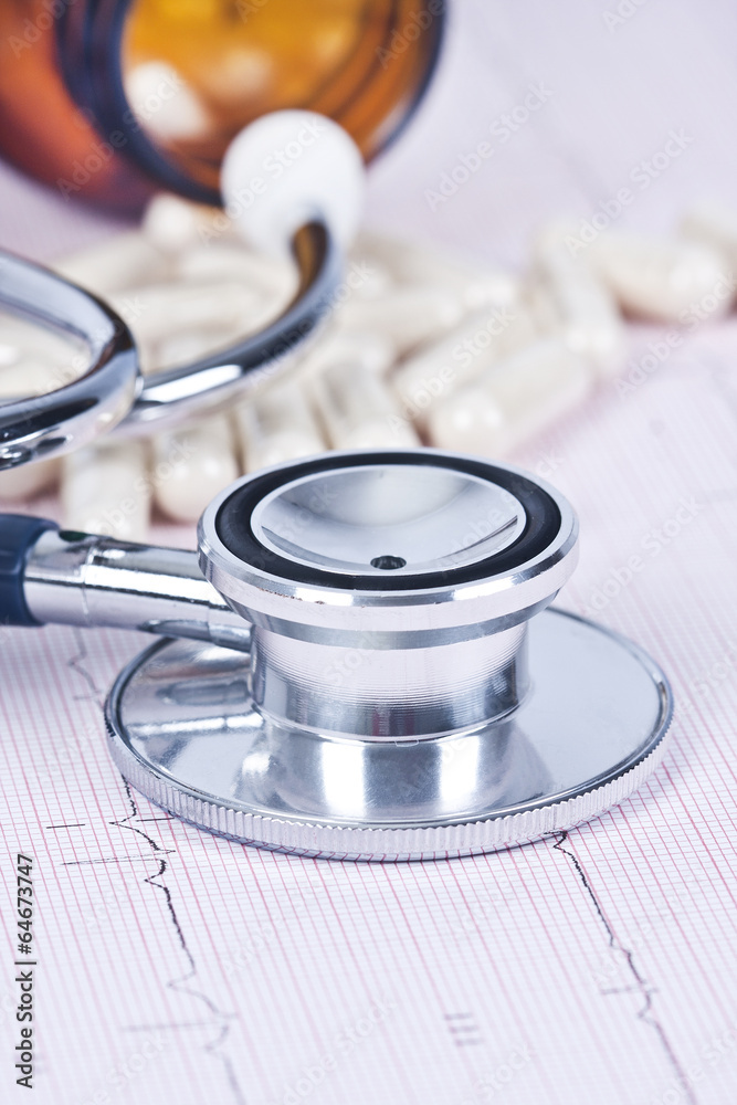 elements of medicine and health, pills and stethoscope elements of medicine and health, pills and stethoscope