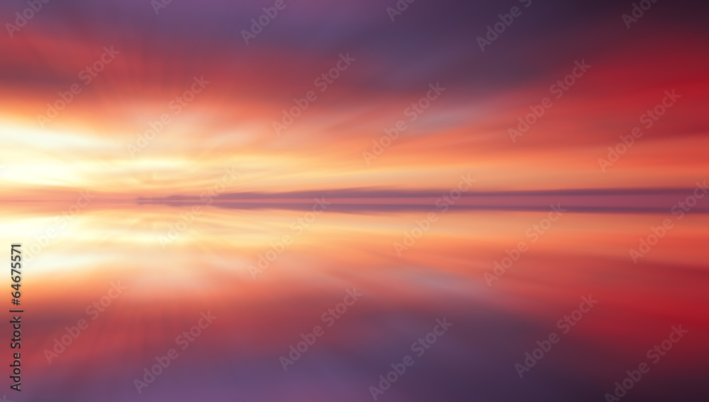 Reflection of colorful sunset clouds with long exposure effect